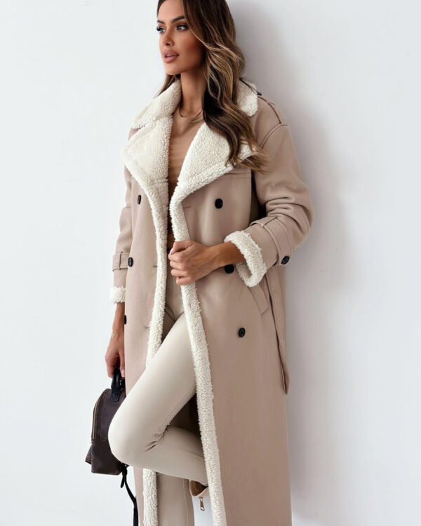 Elevate your style with this elegant, belted, long trench