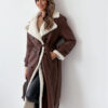 Elevate your style with this elegant, belted, long trench